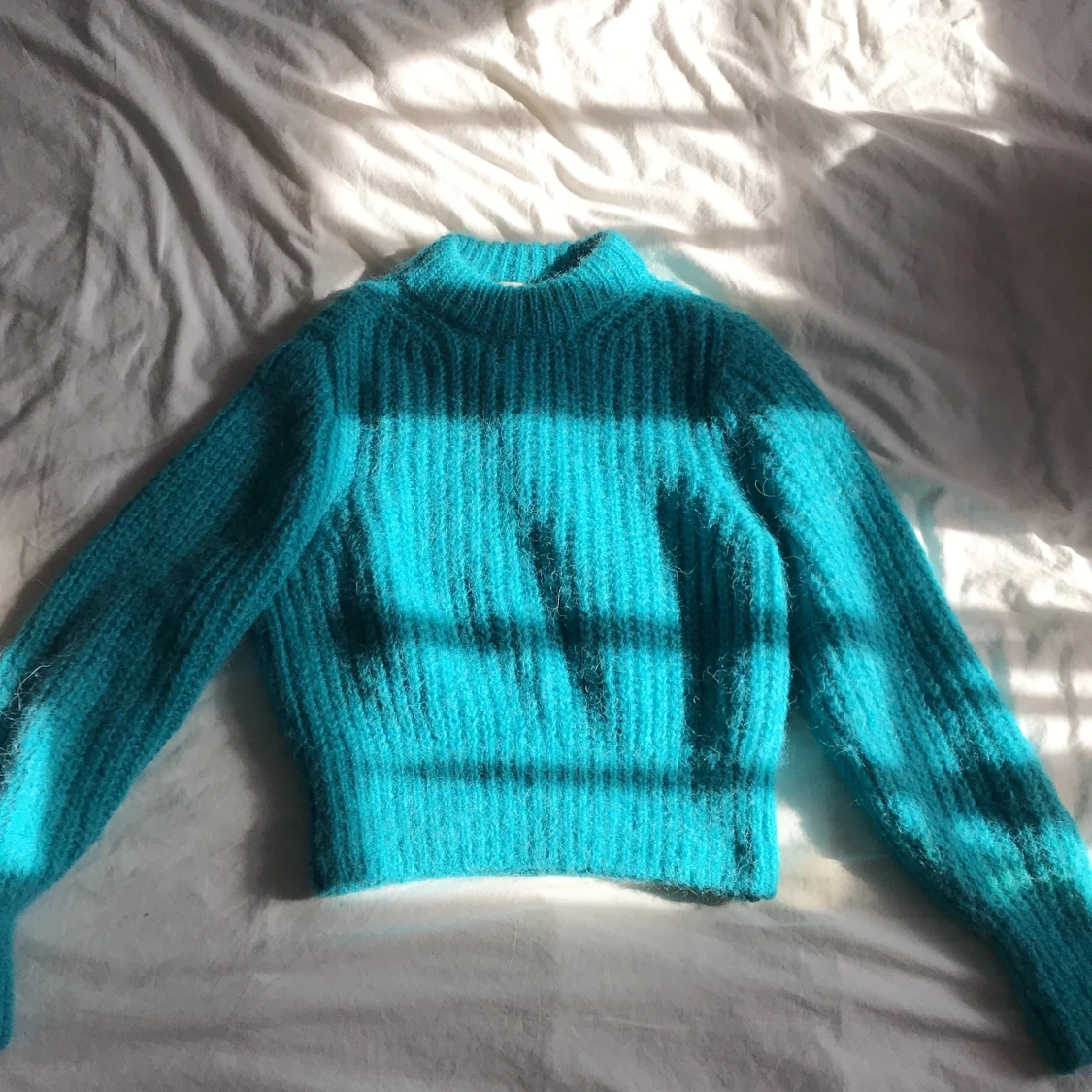 Blå stickad tröja