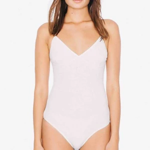  - Vit ribbad body från american apparel, sitter snyggt och är bekväm! Finns inte att köpa längre