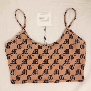  - Crop top med mönster från Missguided. Aldrig använd, lapp kvar. 