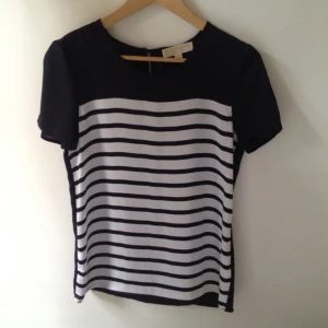  - Michael Kors, white and blue striped shirt