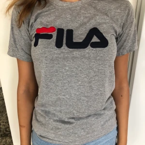 34 - Äkta fila tröja, endast använts en gång.