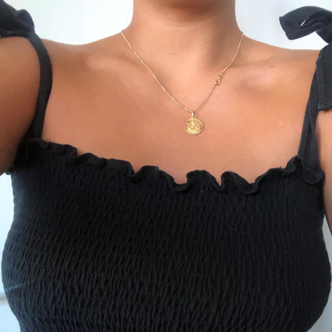 Gullig svart top från HM  - 91