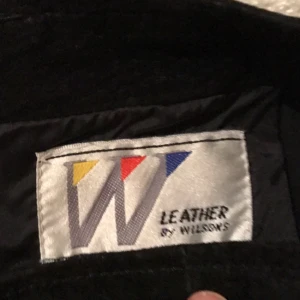  - Suede leather slim skirt in black. Very good condition 