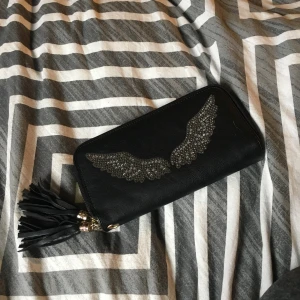  - Plånbok, fått någon gång finns Inget märke