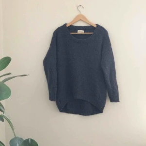  - Stickad oversize tröja från american vintage