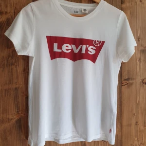  - Never worn. Looser fit so fits M/L