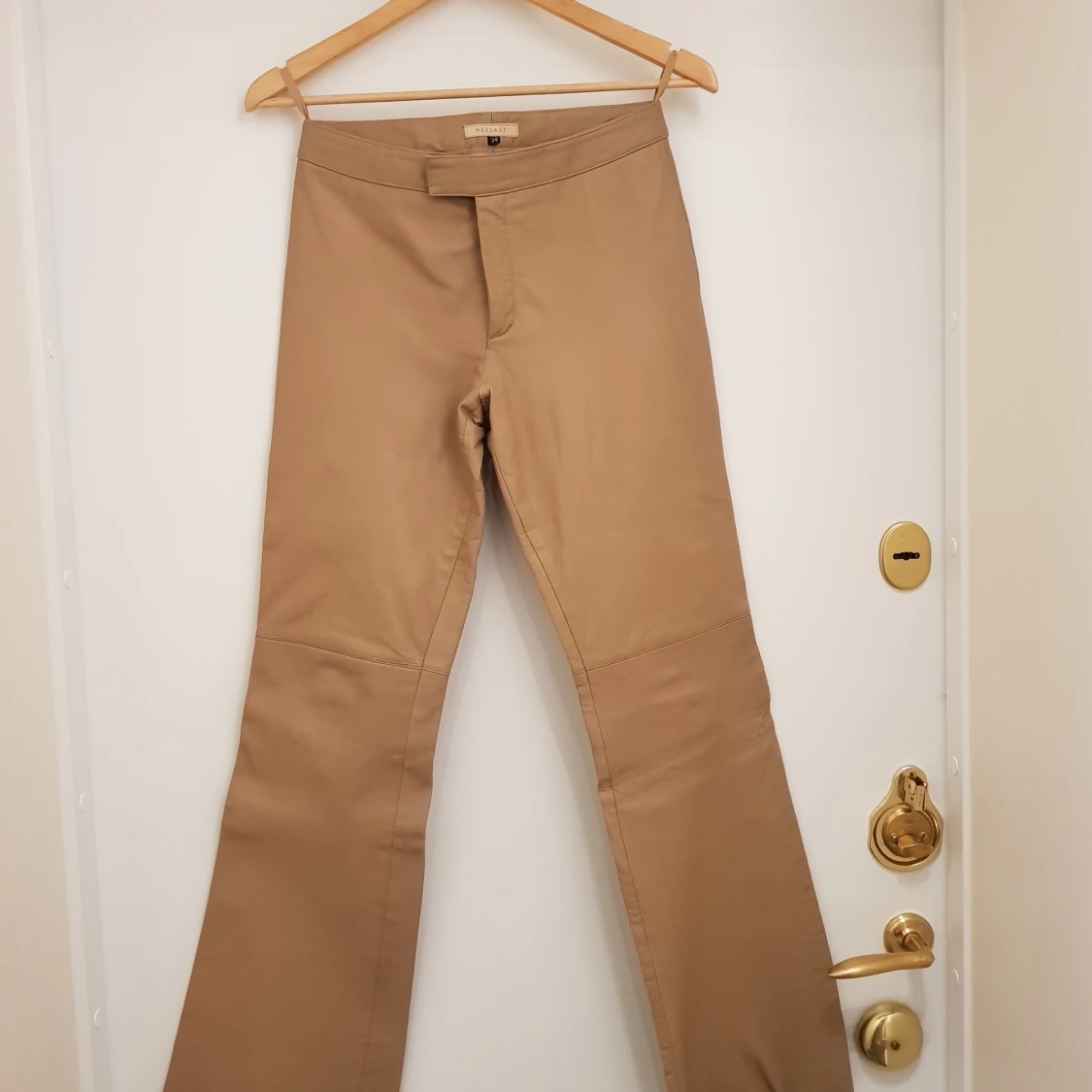 Beige skinnbyxor stl. 34