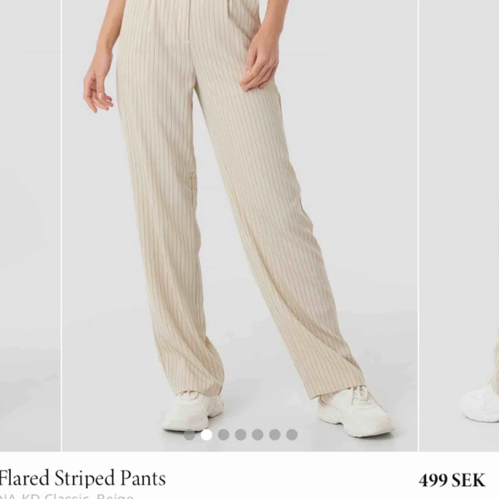 Flared striped pants från NA-KD i storlek 34, knappt använda :) (nypris 499 mitt pris 299) . Jeans & Byxor.