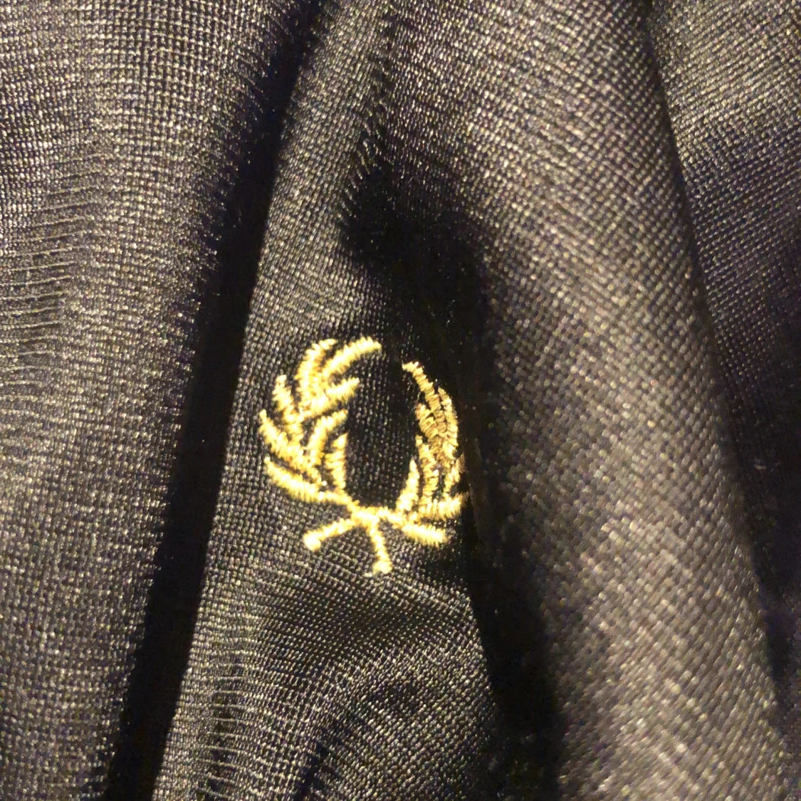 Svart Fred Perry trocktröja med dragskedja storlek 38 - 91