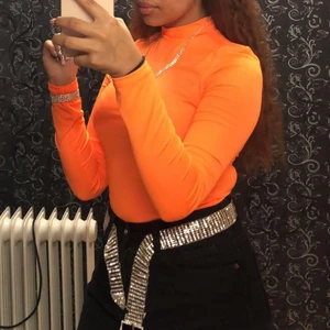 Body suit - Neon orange body suit. Endast använt 1 gång. Storlek S