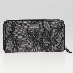 Original Valentino wallet. Lace canvas from the outside and all leather inside. Absolutely gorgeous wallet.  