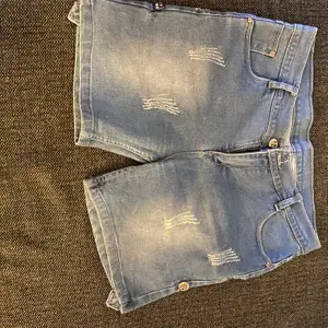 Denim shorts available....used 1-2 times....like new...waist size-32 inches ....length- 42cm .....length can be folded and adjusted