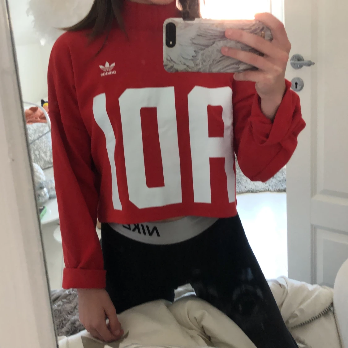 En adidas sweatshirt med en polo krage  - 90