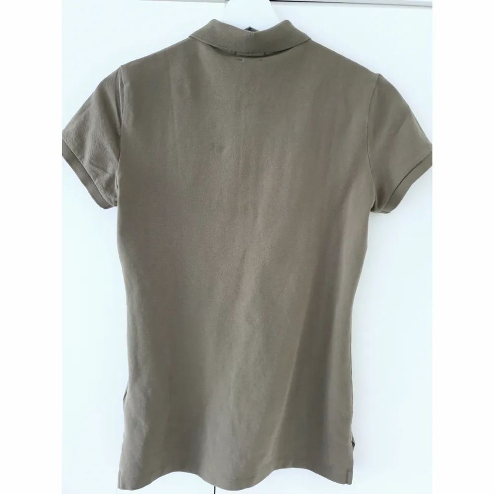 Polo Ralph Lauren T-shirt for sale. Army green color, slim-fit, XS. Great condition, as new!. T-shirts.