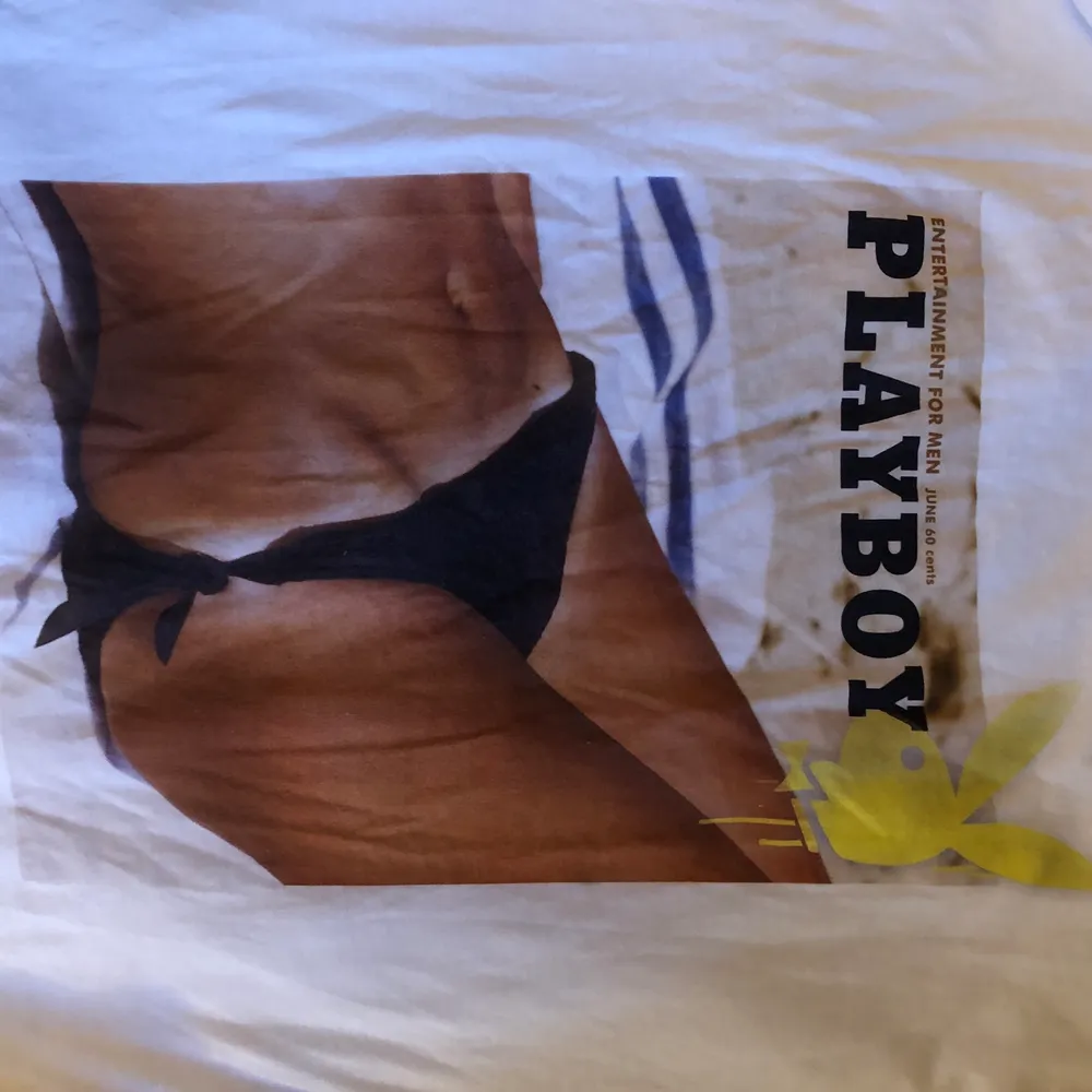 Almost perfect condition Missguided X Playboy tshirt. Super cool graphic on the back. Soft shirt!. T-shirts.