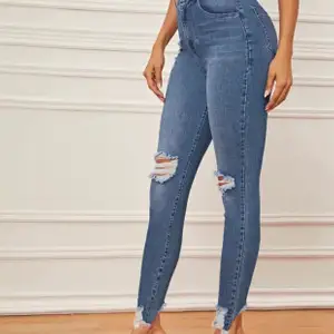 Slitna jeans helt oanvända 