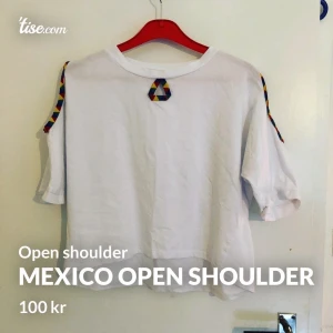 Mexico open shoulder - Latinamerikansk top med öppning för axlar samt en öppning framtill som detalj i form av triangel. Aldrig använd. Legat och ekat i byrån i flera år.