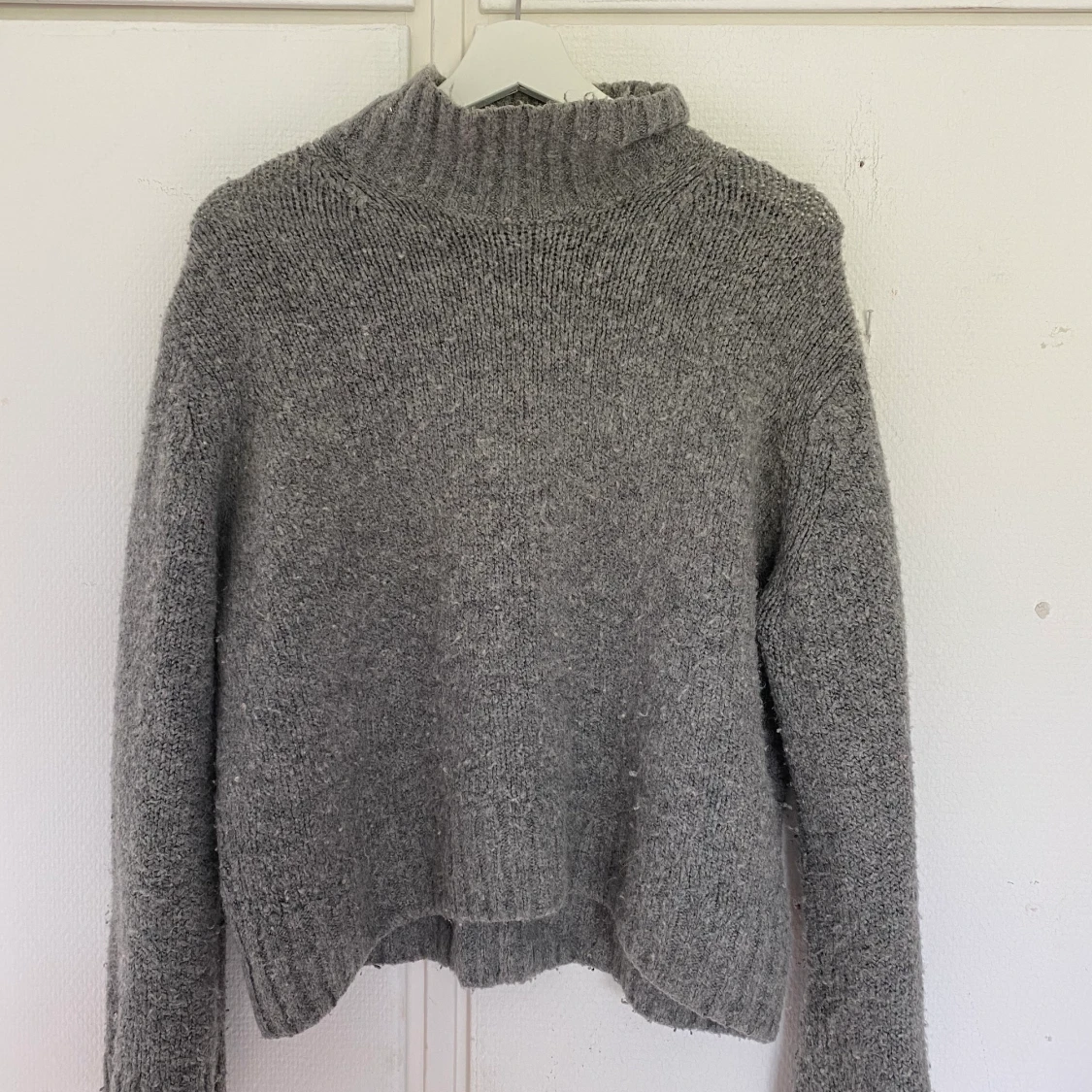 Stickadtröja med krage