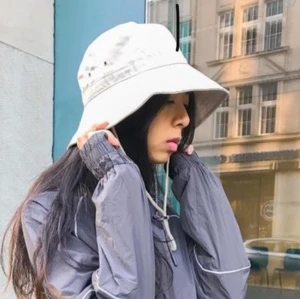 Drawstring Bucket hat - Beige bucket hat with draw string. Contact for more details
