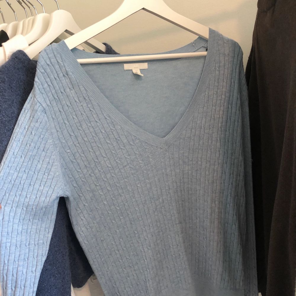 Ljusblå Stickad tröja/knit från H&M i storlek M. Stickat.