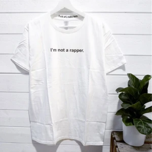  - Tshirt med texten "Im not a rapper". Aldrig använd då den var lite för stor för mig. Frakt ingår i priset.