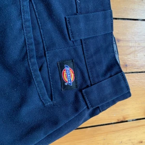 Blå dickies shorts  - Blå avklippta dickies shorts i ”slim taper”.