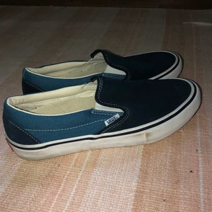 Vans slip on - Som nya, använda väldigt få gånger. 