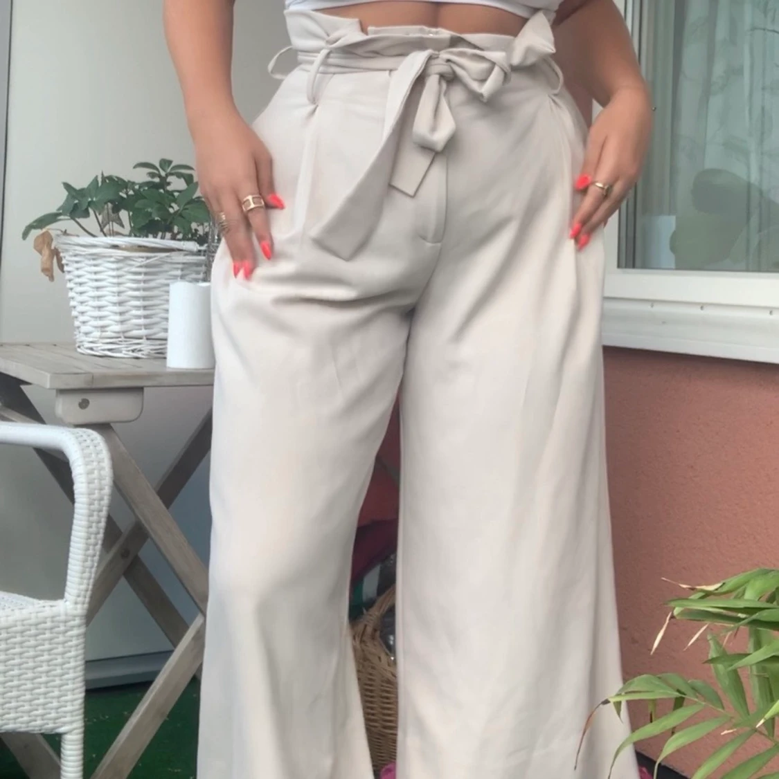 beiga kostymbyxor från Wera