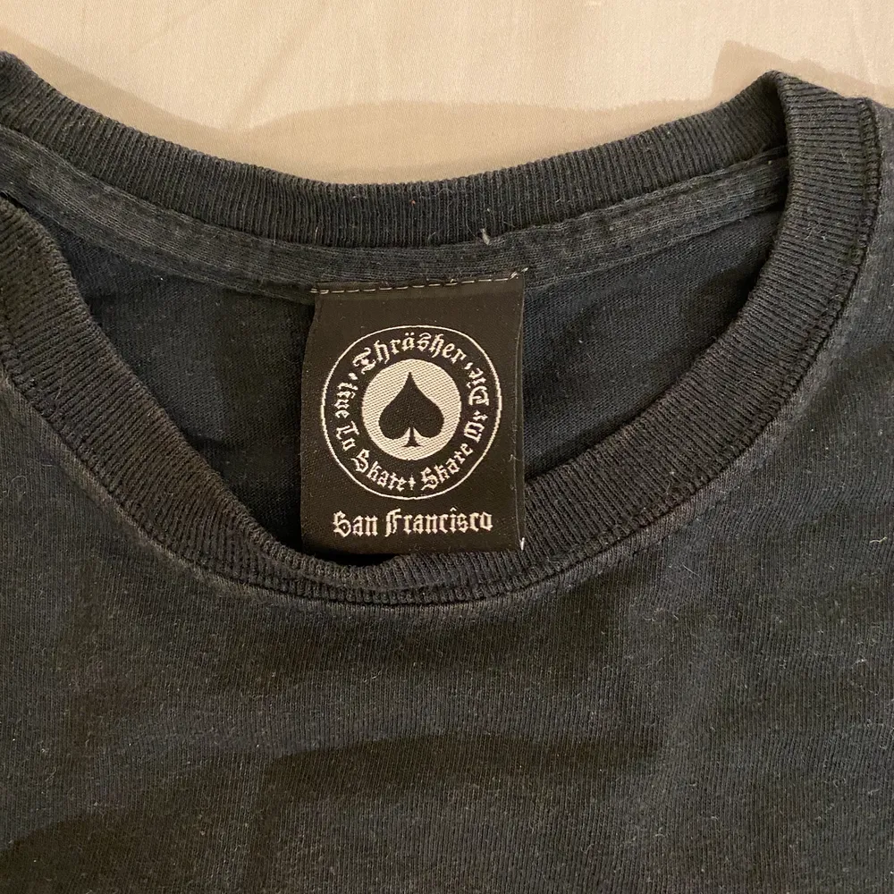 En thrasher tshirt jag fick för ett par år sedan, kommer inte till användning då jag inte känner att det passar min stil. frakt tillkommer!. T-shirts.