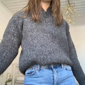  - En 100% ull tröja