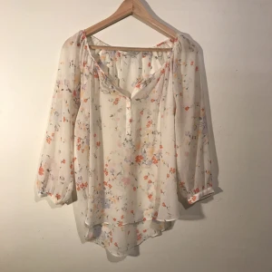  - Floral blouse from Lauren Conrad. 