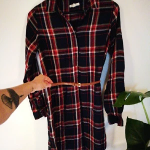  - Casual tunica/dress. Fabric is really soft to the touch and falls nicely.