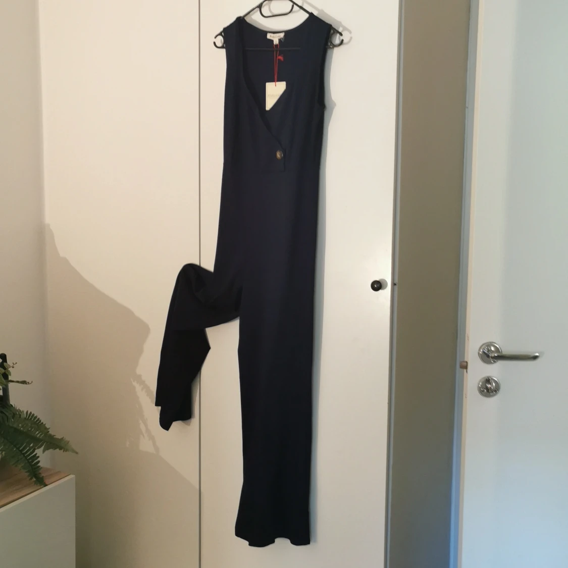 Marinblå byxdress stl M