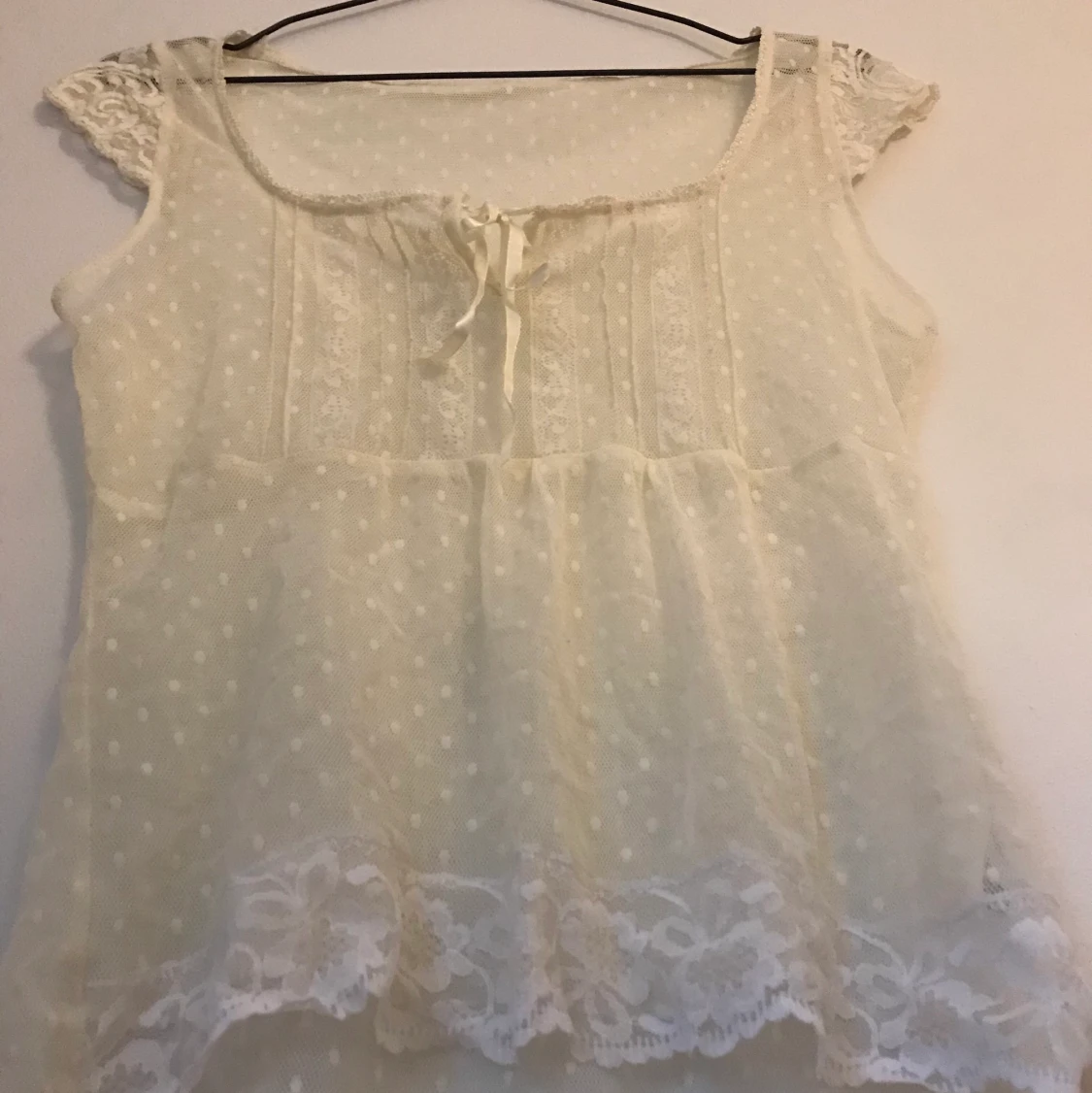 Vit spetstopp i nät - 91