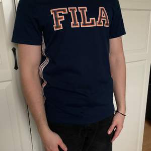 Säljer snyggaste Fila t-shirt då den ej används längre. 
