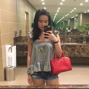  - Ruffled gingham top