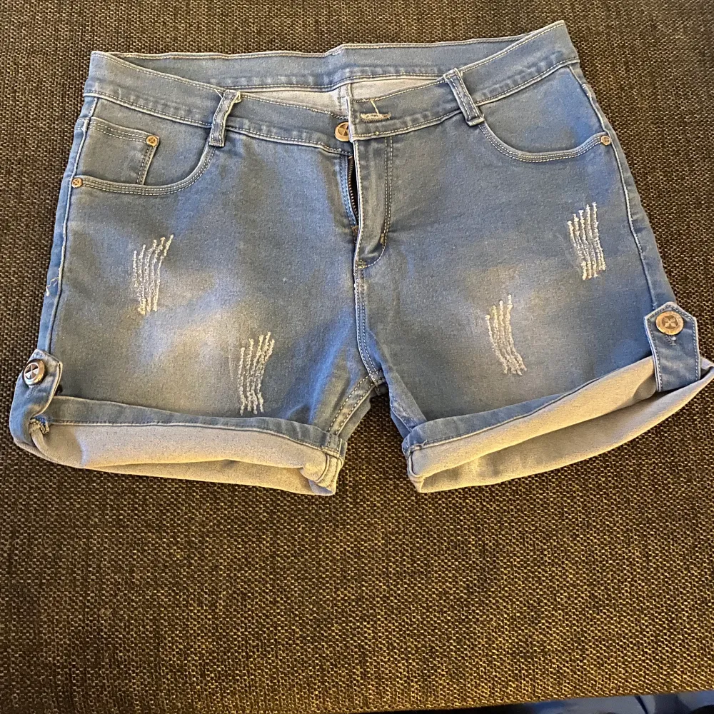 Denim shorts available....used 1-2 times....like new...waist size-32 inches ....length- 42cm .....length can be folded and adjusted. Shorts.
