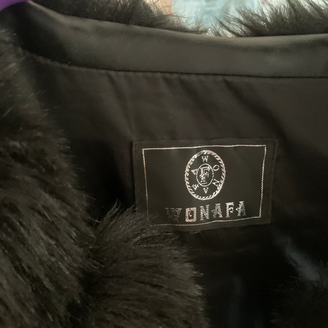 Svart pälsväst - 90