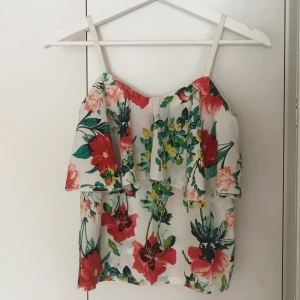 Topp - Blommig topp.