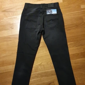 Oanvända o nya nudie jeans grim tim - Aldrig använda. Storlek 30/34 