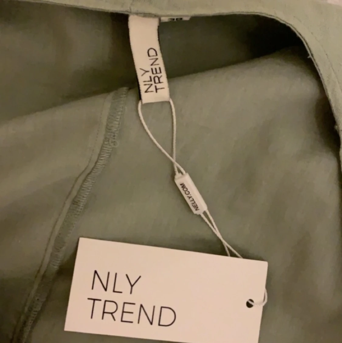 Klänning från Nelly , alldrig använd storlek 38 - 90