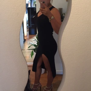  - Black and gray long slit dress free size brand new w/ tag  280 each