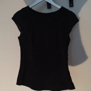  - Collar top. Dragkedja i sidan.