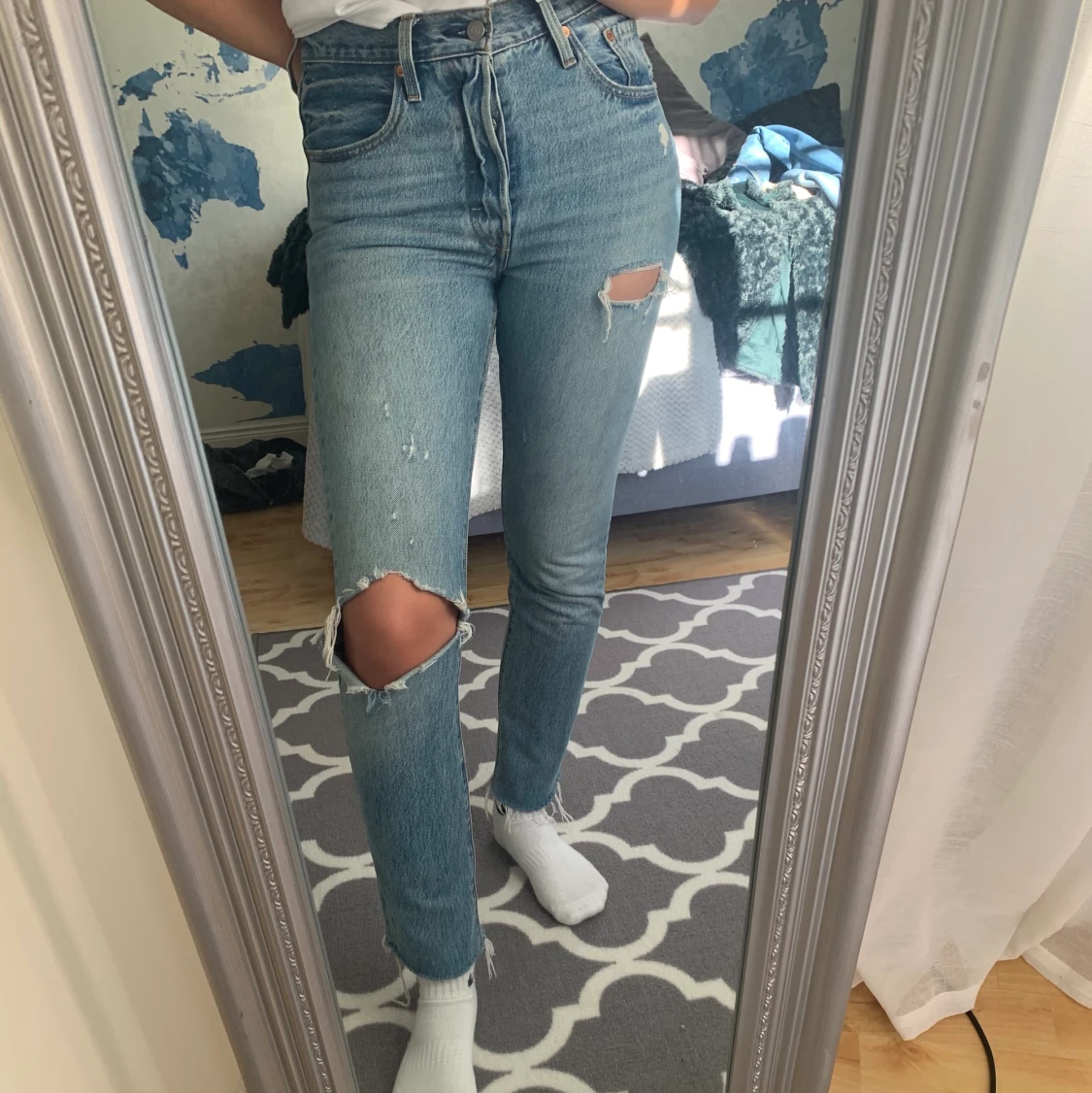 Ljusblåa Levi’s 501 jeans 