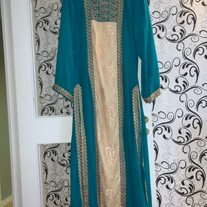 Klänning - Jättefin klänning i färgen ljus aktig blå och aldrig använd.