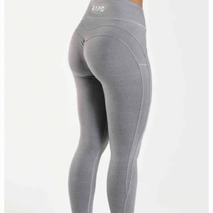  - Supersnygga träningstights från Rapid Wear i nyskick. Nypris 700kr. Frakt tillkommer!