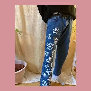 Vintage jeans hand painted with cotton paint! Quite large in size, would fit waist 33-36. Model wears size 30-34, so can be worn belted! 