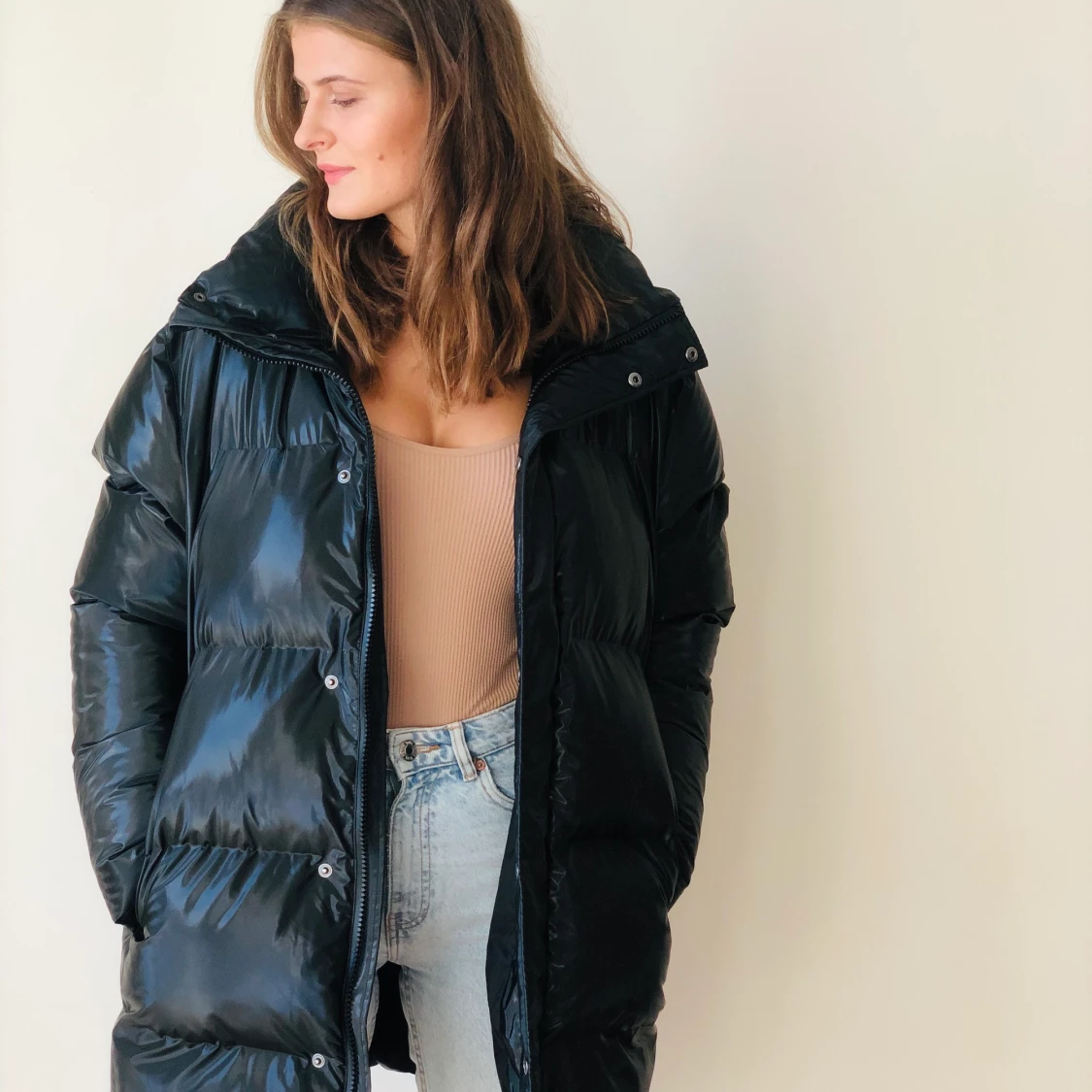 Black puffy coat by Rains