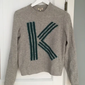  - Kenzo sweater, really good condition! Shipping depends on location.