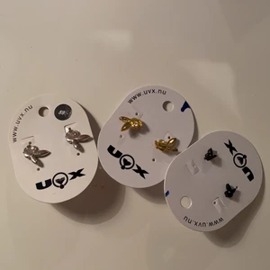 Örhängen - Superfina örhängen som ser ut som Playboyloggan! De silvriga är använda enstaka gånger men de guldiga och svarta är aldrig använda. 35kr styck. (De guldiga och silvriga är sålda)